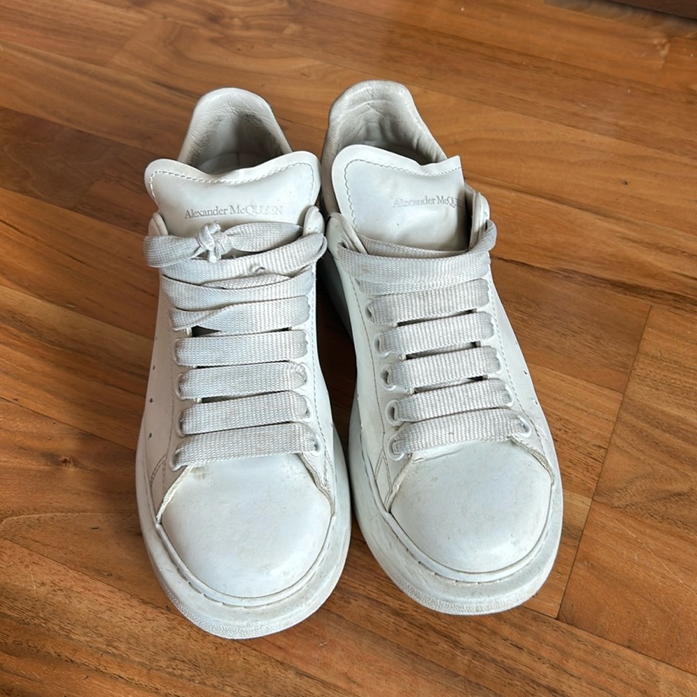 Well worn Alexander McQueen sneakers